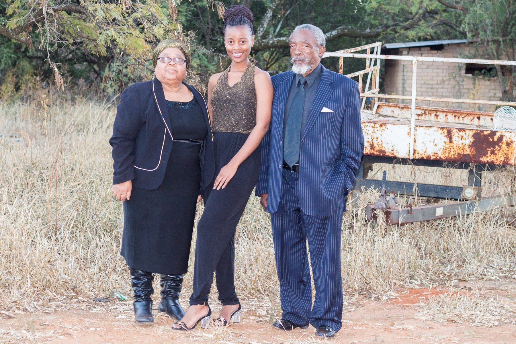 Lindiwe Millicent Mokuena standing with family.